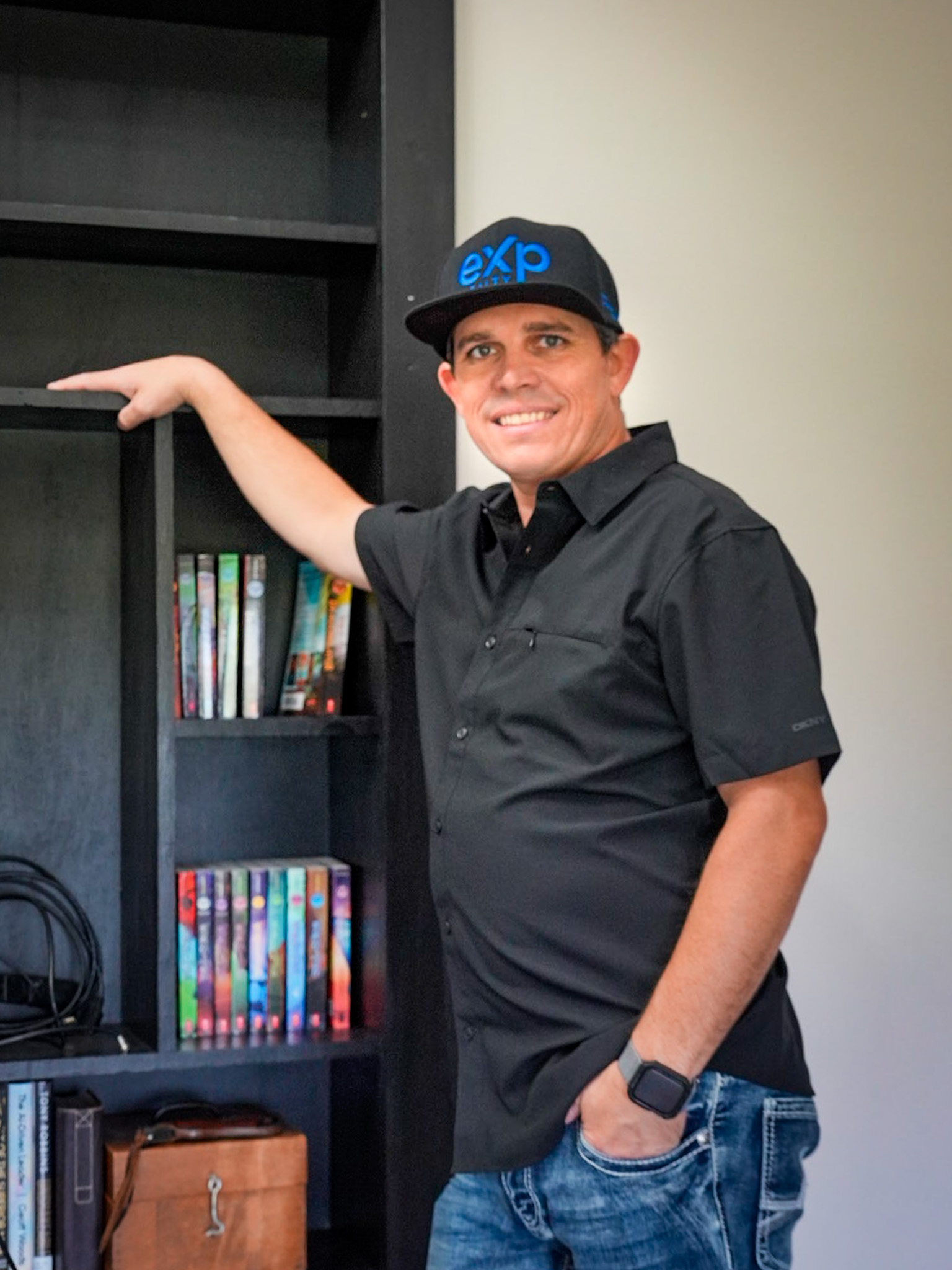 Travis Wright smiling in a professional portrait for Fort Sill relocation clients
